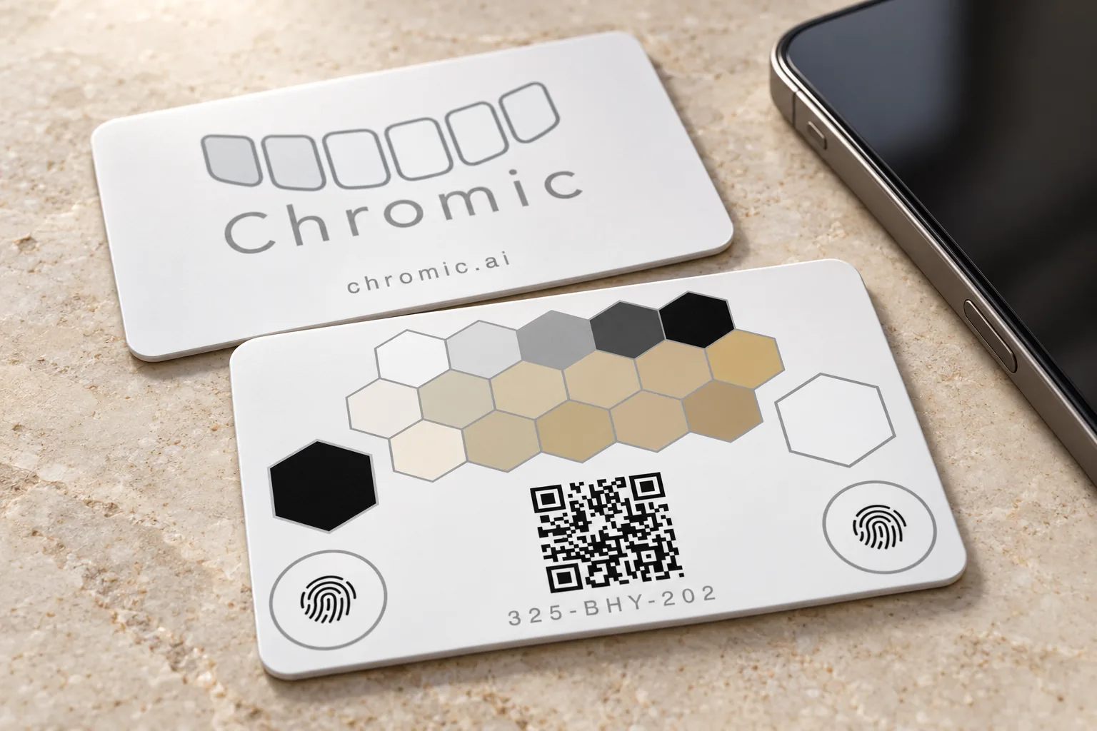 Illustrative product scene showing both faces of the Chromic card beside a phone, with the patches, QR and placement markers visible.